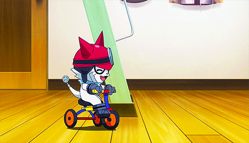 Gif of Gatchmon riding a tricycle.